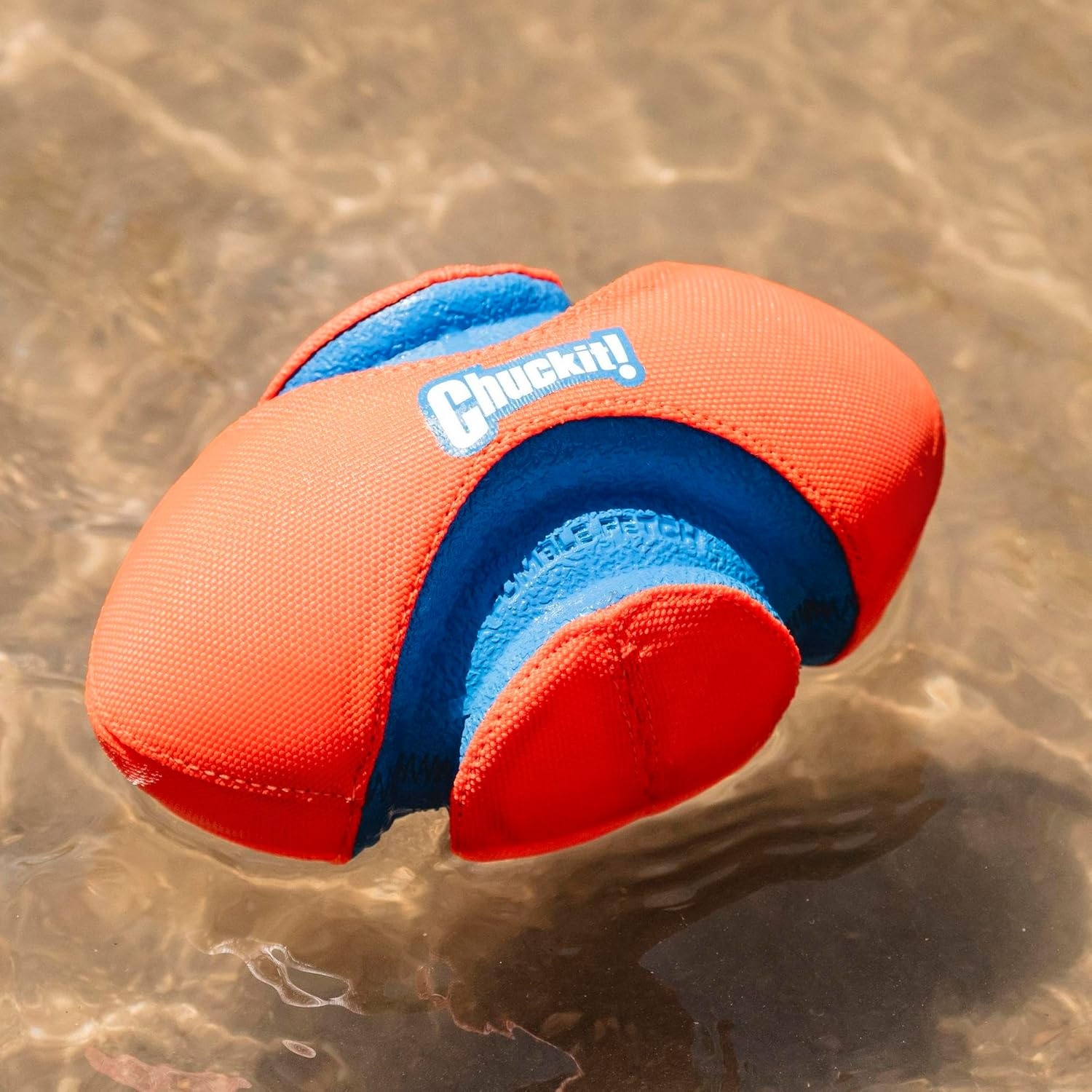 image:imageChuckit Fumble Fetch Dog Football Outdoor and Indoor Interactive Dog Toy with Grooved Design for Easy Pickup Made from Durable Rubber Floats in Water Small Orange and BlueSmall